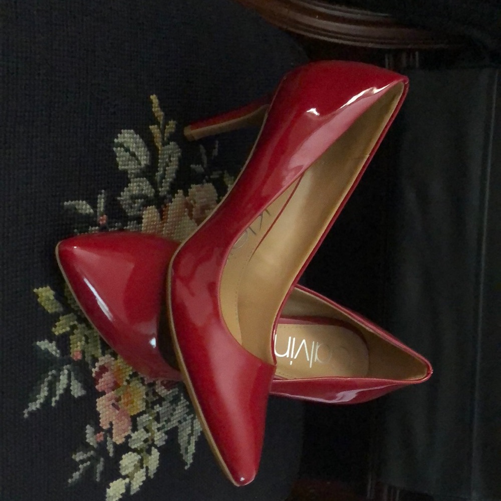 Red heels with silver accent on heel size 7.